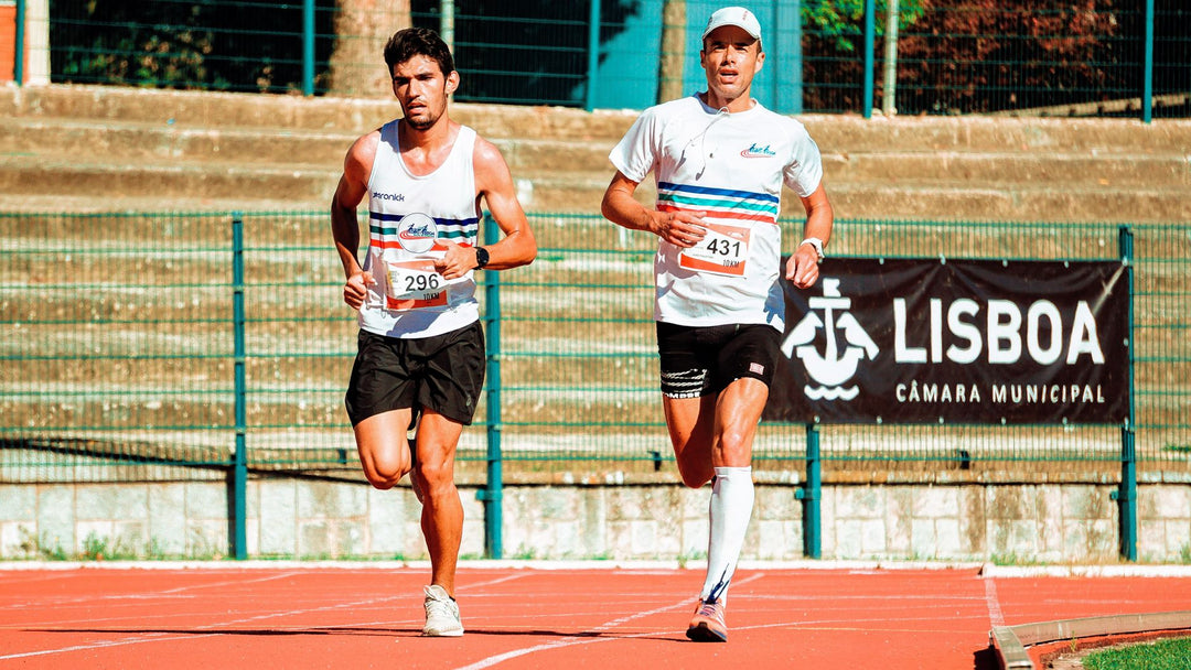 two marathon runners competing during a sunny road race