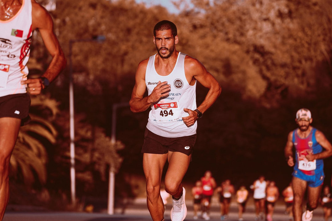 Marathon runners competing outdoors, showcasing determination and athleticism.